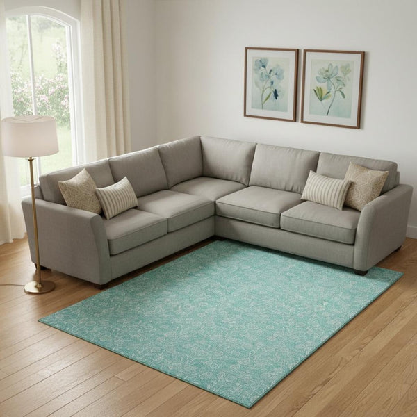 HomeRoots 10' X 14' Teal & Ivory Floral Area Rug - Washable, UV Protected, Perfect for Family Spaces & Pets 656430