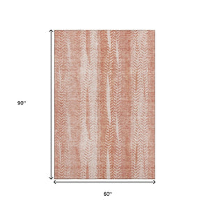 HomeRoots 5' X 8' Coral & Ivory Striped Washable Area Rug - UV Protected, Soft, Durable for Busy Homes 656521