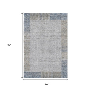 HomeRoots 5' X 8' Taupe and Blue Geometric Area Rug - Washable, UV Protected, Perfect for High-Traffic Spaces! 656545