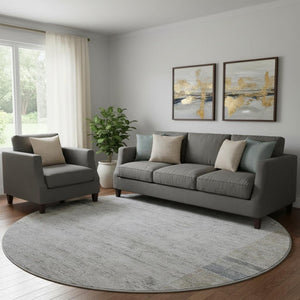 HomeRoots 8' Taupe and Blue Geometric Round Rug - Washable, UV-Protected, Perfect for High-Traffic Areas! 656546