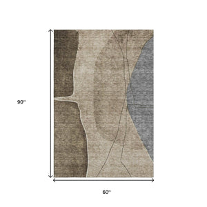 HomeRoots 5' X 8' Abstract Area Rug in Brown, Beige & Blue - Washable, UV Protected, Stain Resistant Design 656551