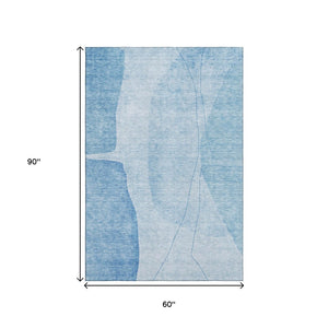 HomeRoots 5' Blue and Ivory Abstract Area Rug - Washable, UV Protected, Stain Resistant for High-Traffic Areas 656557