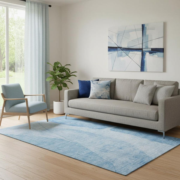 HomeRoots 5' Blue and Ivory Abstract Area Rug - Washable, UV Protected, Stain Resistant for High-Traffic Areas 656557