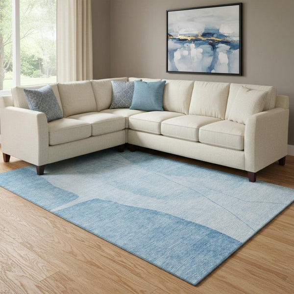 HomeRoots 8' X 10' Blue And Ivory Abstract Washable Area Rug - Stylish, Durable, UV-Protected for Modern Homes 656559