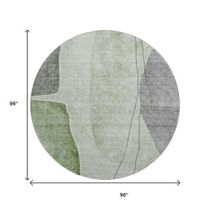 HomeRoots 8' Round Abstract Washable Rug in Green, Gray, Ivory - UV Protected, Durable & Stylish for Any Space 656564