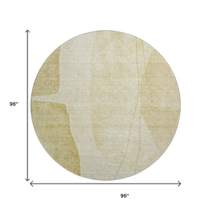 HomeRoots 8' Gold And Beige Washable Round Rug – Modern Abstract Design, UV Protected & Stain Resistant! 656570