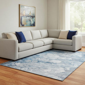 HomeRoots 9' X 12' Stylish Blue and Ivory Abstract Area Rug – Washable, UV Protected, Perfect for High-Traffic Spaces 656710