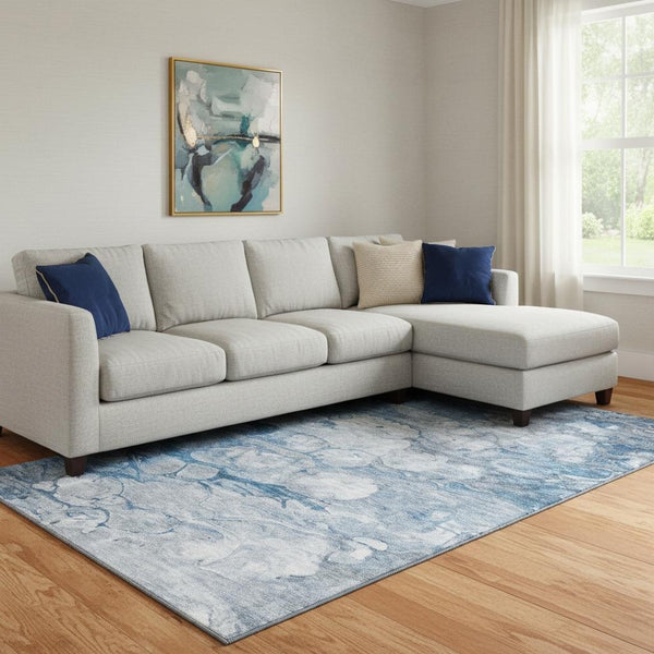 HomeRoots 10' X 14' Blue And Ivory Abstract Washable Area Rug - Durable, UV-Protected, Modern Design for Homes 656711
