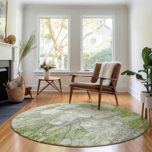 HomeRoots 8' Olive Green Abstract Round Rug - Washable, UV Protected, Stain Resistant for Modern Spaces 656720