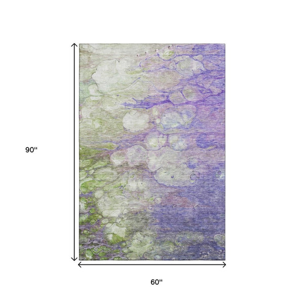 HomeRoots 5' X 8' Abstract Washable Area Rug in Purple, Green & Ivory - UV Protected, Durable & Stylish Design 656725