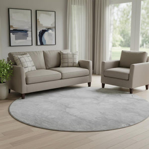 HomeRoots 8' Silver and Gray Abstract Round Rug - Washable, UV Protected, Perfect for High-Traffic Areas! 656774
