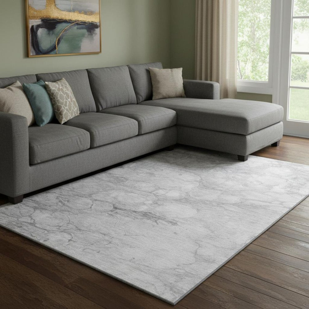 HomeRoots 10' X 14' Silver and Gray Abstract Area Rug – Washable, UV-Protected, Stylish for High-Traffic Spaces 656777