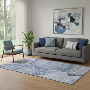 HomeRoots 5' X 8' Blue And Ivory Floral Rug - Washable, UV-Protected, Durable Design for Family Spaces 656791