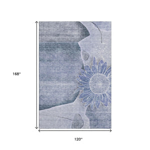 HomeRoots 10' Blue and Ivory Floral Area Rug – Washable, UV Protected, Stain Resistant for High-Traffic Spaces 656795