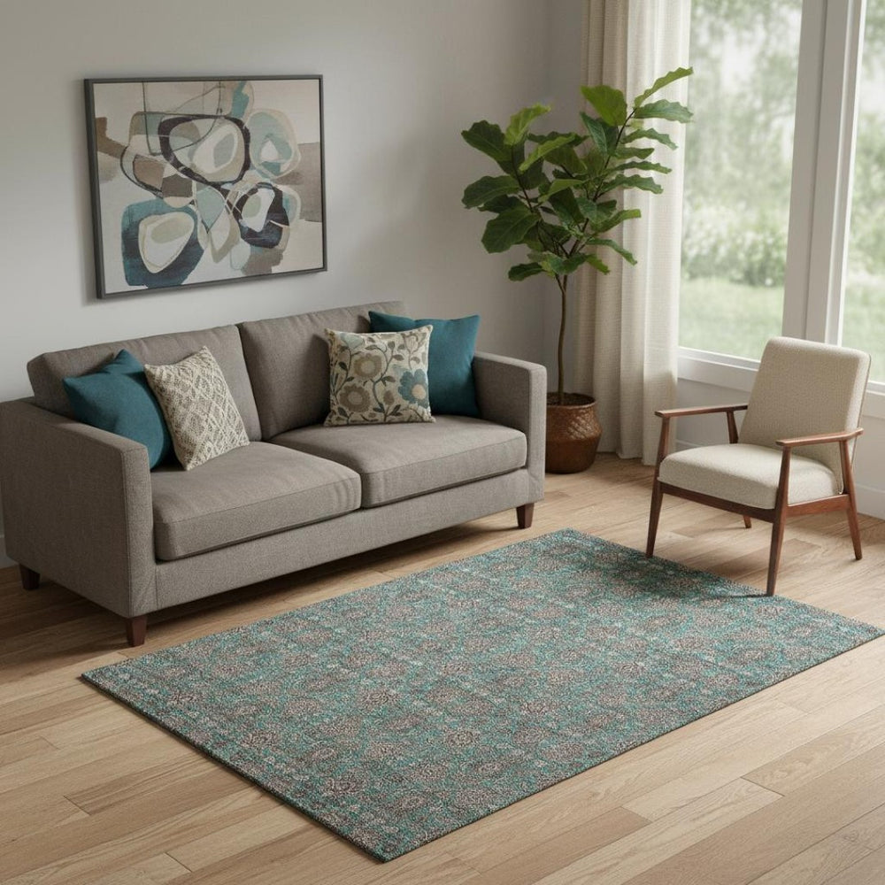 HomeRoots 5' X 8' Teal & Beige Floral Area Rug - Washable, UV-Protected, Stain Resistant for High-Traffic Spaces 656857