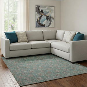HomeRoots 9' X 12' Teal Floral Area Rug - Washable, UV-Protected, Stain-Resistant for High-Traffic Spaces 656860