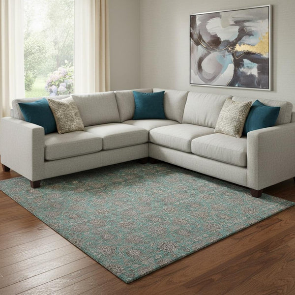 HomeRoots 10' Teal and Beige Floral Area Rug - Washable, UV-Protected, Stain-Resistant for Busy Homes 656861