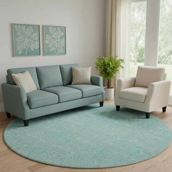 HomeRoots 8' Aqua and Ivory Floral Round Rug - Washable, UV Protected, Durable Design for Homes with Kids & Pets 656870
