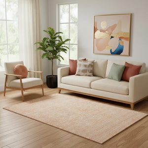 HomeRoots 5' X 8' Peach and Ivory Floral Area Rug - Washable, Stain Resistant, UV Protected for Family Homes 656911