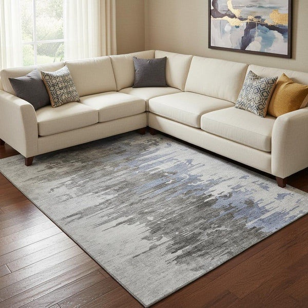 HomeRoots 8' X 10' Abstract Blue Gray and Ivory Area Rug - Durable, Washable, UV Protected for Modern Spaces 656931