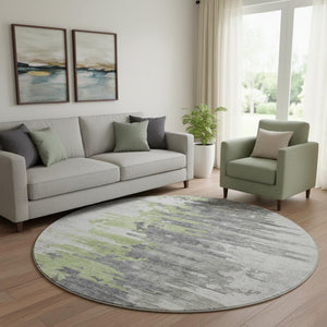 HomeRoots 8' Modern Abstract Round Area Rug in Green, Gray & Ivory - Washable, UV Protected, Stain Resistant 656936