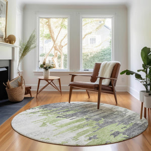HomeRoots 8' Modern Abstract Round Area Rug in Green, Gray & Ivory - Washable, UV Protected, Stain Resistant 656936