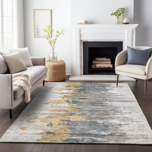 HomeRoots 10' X 14' Ivory Gold & Gray Abstract Area Rug - Washable, UV Protected, Durable for High-Traffic Spaces 656945