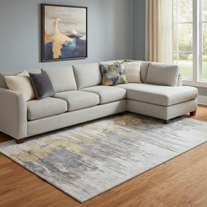 HomeRoots 10' X 14' Ivory Gold & Gray Abstract Area Rug - Washable, UV Protected, Durable for High-Traffic Spaces 656945