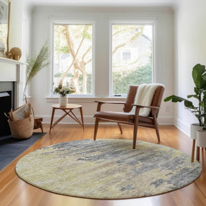 HomeRoots 8' Contemporary Pewter Silver & Gold Abstract Washable Round Rug with UV Protection & Stain Resistance 656954