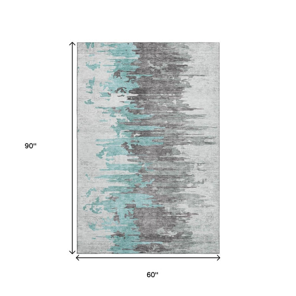 HomeRoots 5' X 8' Abstract Area Rug in Teal, Gray & Ivory – Soft, Washable, UV-Protected for High-Traffic Spaces 656959