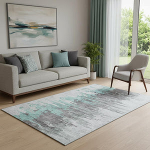 HomeRoots 5' X 8' Abstract Area Rug in Teal, Gray & Ivory – Soft, Washable, UV-Protected for High-Traffic Spaces 656959