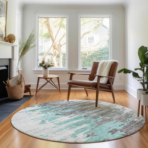 HomeRoots 8' Teal Gray and Ivory Abstract Washable Round Rug - Durable, UV-Protected, Stylish Home Décor Choice 656960