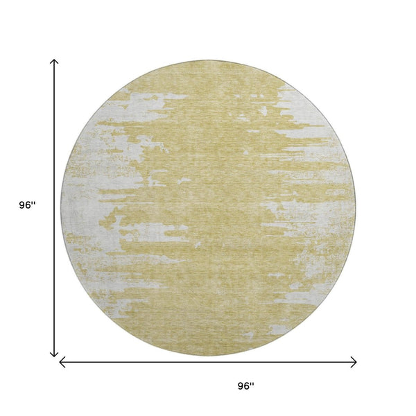HomeRoots 8' Gold and Ivory Abstract Round Rug - Washable, UV-Protected, Stylish Solution for High-Traffic Areas 656972