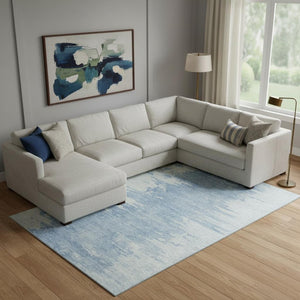 HomeRoots 9' X 12' Sky Blue & Ivory Abstract Washable Area Rug with UV Protection for Stylish Living Spaces 656986