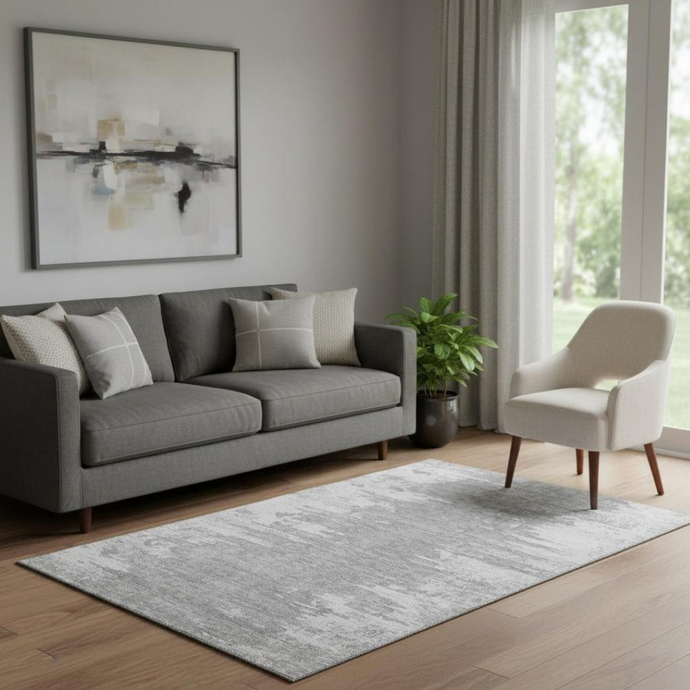 HomeRoots 5' X 8' Stylish Silver and Gray Abstract Area Rug – Washable, UV-Protected, and Durable for Homes! 656989