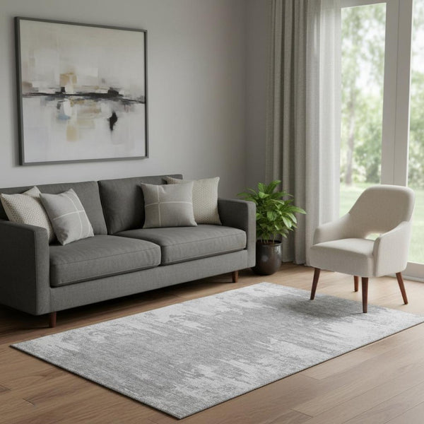 HomeRoots 5' X 8' Stylish Silver and Gray Abstract Area Rug – Washable, UV-Protected, and Durable for Homes! 656989