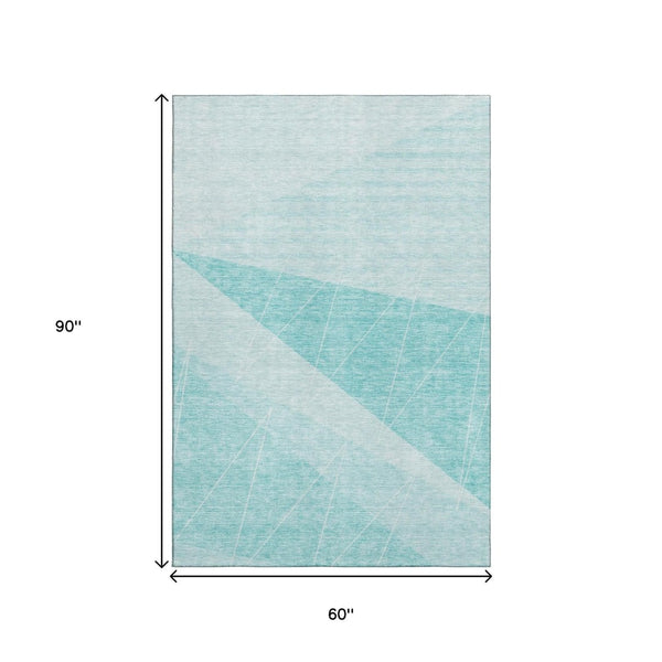 HomeRoots 5' X 8' Teal and Ivory Geometric Area Rug - Washable, UV-Protected, Stylish for Any Space! 657043
