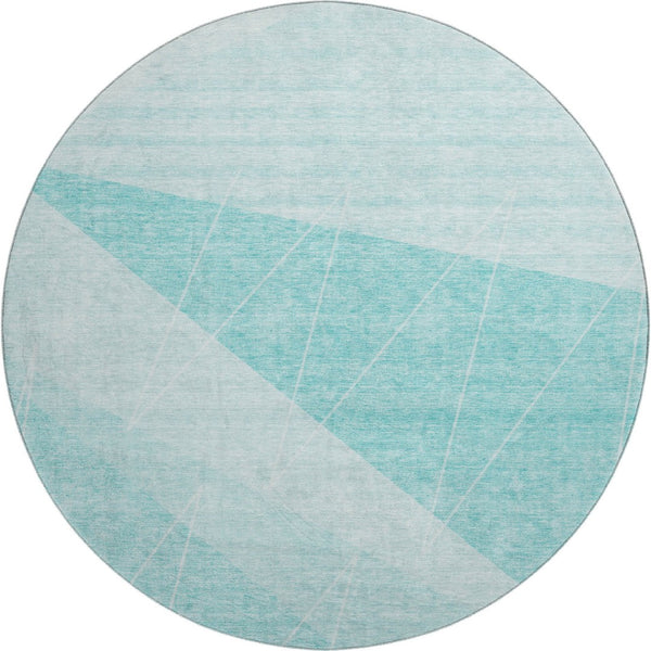 HomeRoots 8' Teal And Ivory Geometric Round Rug - Washable, UV Protected, Durable for Modern Living Spaces 657044