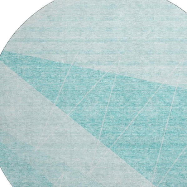 HomeRoots 8' Teal And Ivory Geometric Round Rug - Washable, UV Protected, Durable for Modern Living Spaces 657044