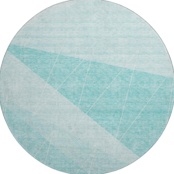 HomeRoots 8' Teal And Ivory Geometric Round Rug - Washable, UV Protected, Durable for Modern Living Spaces 657044