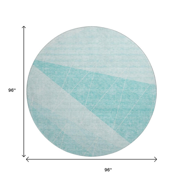 HomeRoots 8' Teal And Ivory Geometric Round Rug - Washable, UV Protected, Durable for Modern Living Spaces 657044