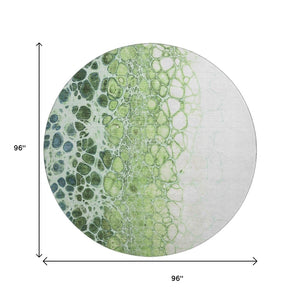 HomeRoots 8' Artichoke Green Blue Ivory Washable Round Rug - Stylish, Durable, UV-Protected for Modern Spaces 657056