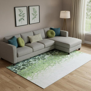 HomeRoots 9' X 12' Modern Abstract Washable Area Rug in Artichoke Green, Blue & Ivory - UV Protected! 657058