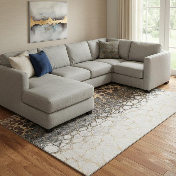 HomeRoots 9' X 12' Ivory Gray Gold Abstract Area Rug - Soft, Stain-Resistant, UV Protected for Modern Homes 657076