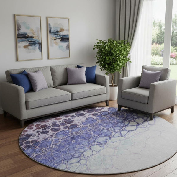 HomeRoots 8' Purple And Ivory Abstract Round Rug - Washable, UV Protected, Non-Slip for Modern Living Spaces 657086