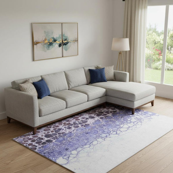 HomeRoots 8' X 10' Purple And Ivory Abstract Area Rug - Stylish, Washable, UV-Protected for Homes with Kids & Pets 657087