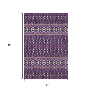 HomeRoots 5' X 8' Purple and Yellow Tribal Area Rug - Washable, UV-Protected, Durable Design for Homes with Kids 657133