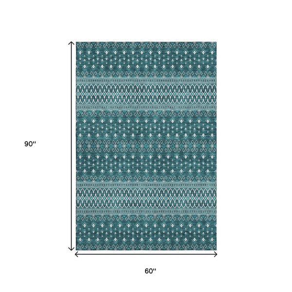 HomeRoots 5' X 8' Teal And Ivory Tribal Area Rug - Stain-Resistant, UV Protected, Non-Slip for Busy Homes 657139