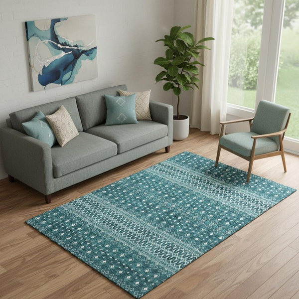 HomeRoots 5' X 8' Teal And Ivory Tribal Area Rug - Stain-Resistant, UV Protected, Non-Slip for Busy Homes 657139