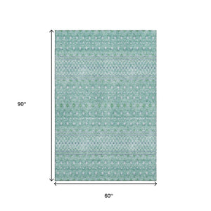 HomeRoots 5' X 8' Aqua And Ivory Tribal Area Rug – Washable, Stain Resistant, UV Protected for Daily Use 657151